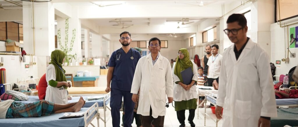 Cardiac surgery consultants and nurses on a ward round in the adult ward at NICVD