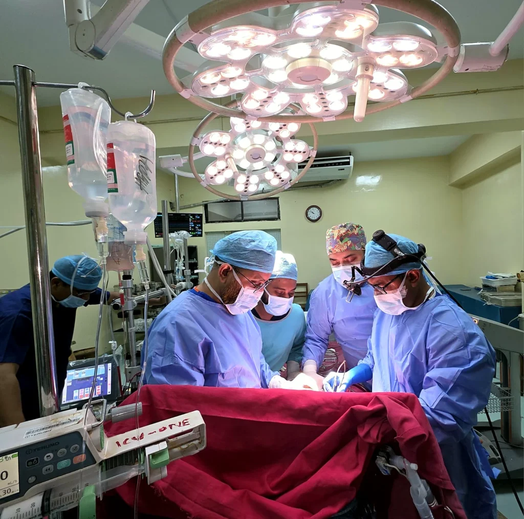 Cardiac surgical team at the operating table during an open-heart procedure, NICVD